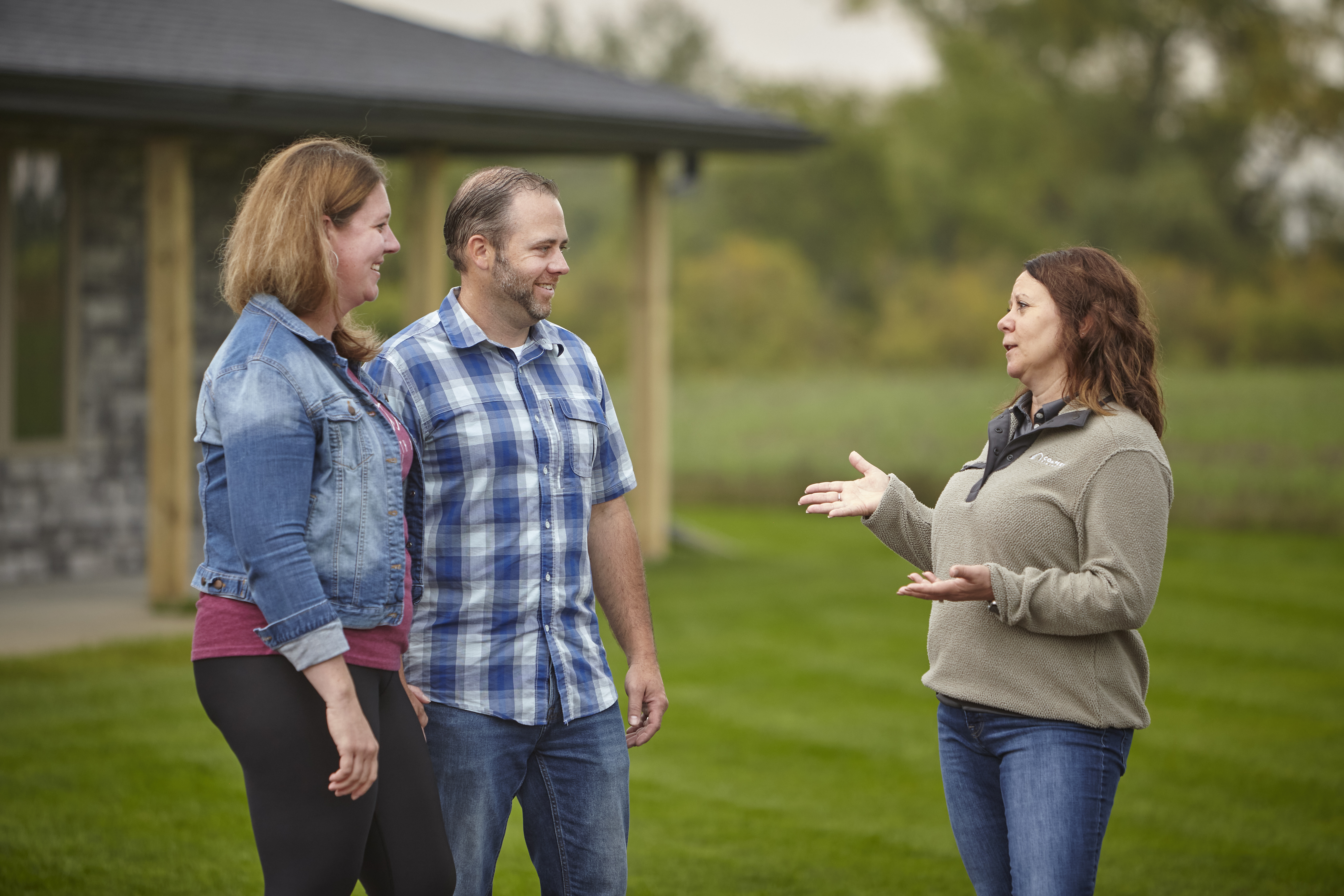 A couple discuss their rural lending needs with a Compeer lending officer.