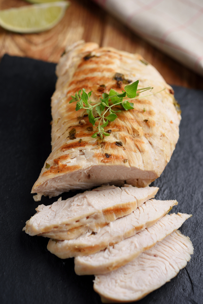 Turkey tenderloin sliced on platter