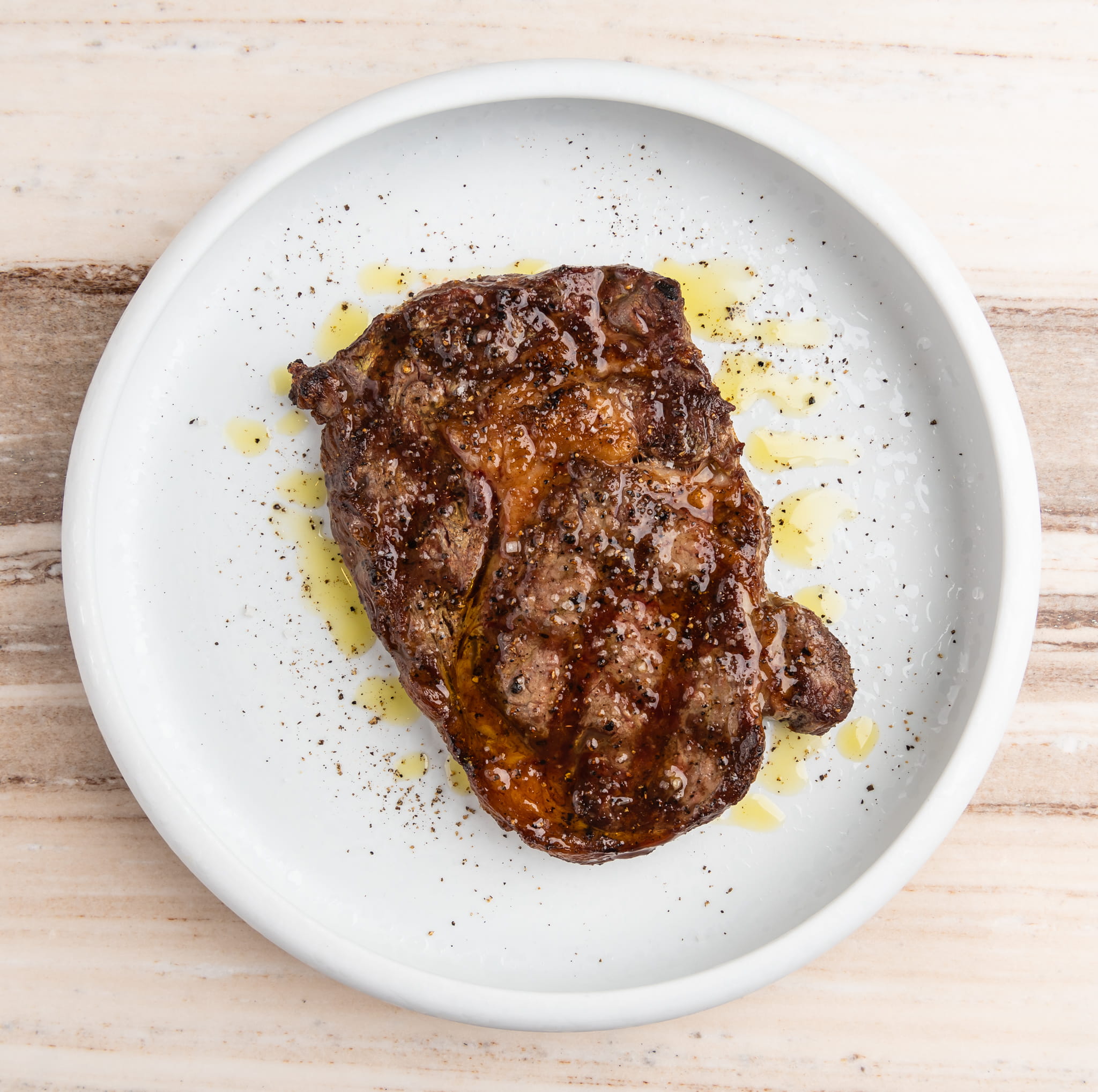 A grilled steak on a plate